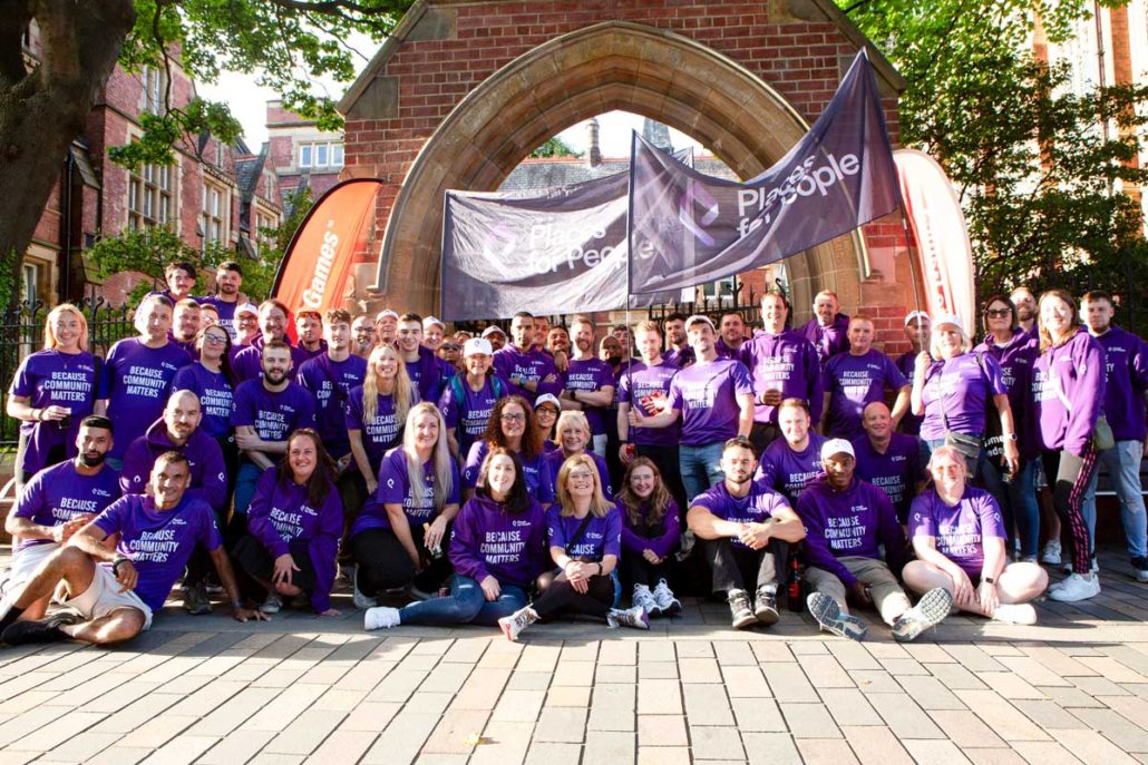 Large team pose for a photograph at University of Leeds