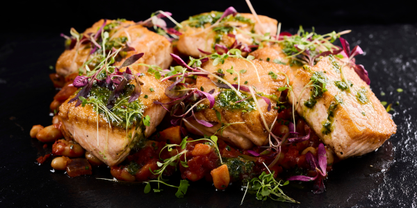 Grilled salmon, borlotti bean stew, salsa verde