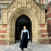 Rosie Lee-Phillips standing outside the Great Hall